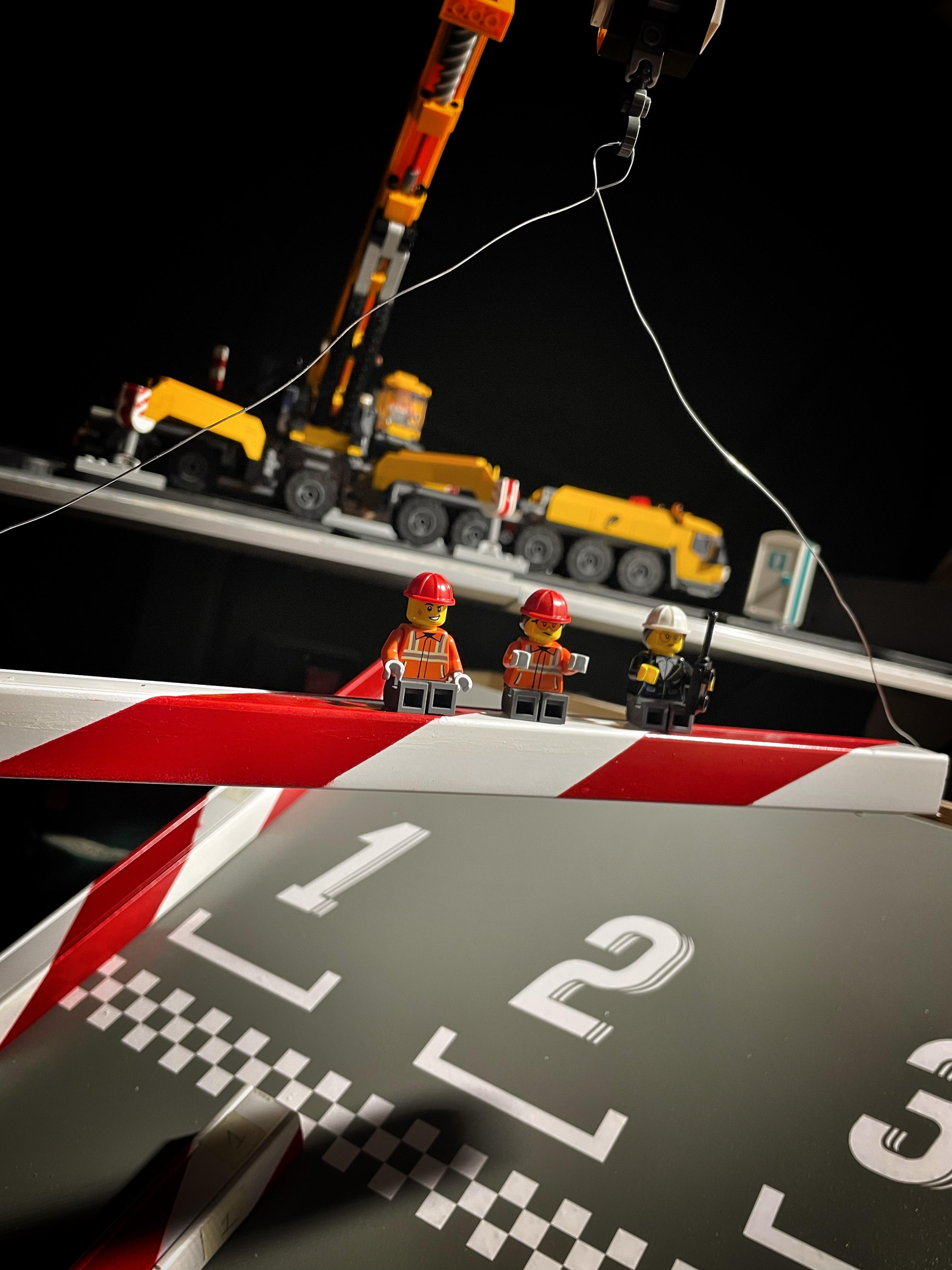 LEGO® workers on racing track
